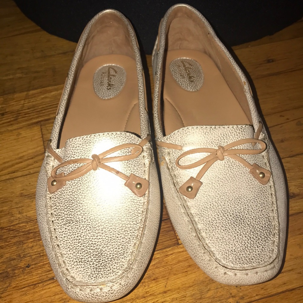 Clark gold flat shoes